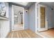 Back porch of the home with railing overlooking nature at 1205 Gettysburg Pl, Sandy Springs, GA 30350