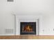 Classic fireplace with white mantel and black hearth, perfect for cozy evenings at 1205 Gettysburg Pl, Sandy Springs, GA 30350
