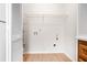 Bright laundry room with ample space and shelving for storage and organization at 1205 Gettysburg Pl, Sandy Springs, GA 30350