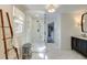 Bright bathroom with a walk-in shower, vanity, and a peek into a walk-in closet at 2190 Spalding Dr, Sandy Springs, GA 30350