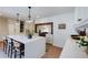 Bright kitchen featuring a large island with seating and modern finishes at 2190 Spalding Dr, Sandy Springs, GA 30350