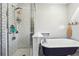 Bathroom featuring subway tile shower, claw foot tub, and vintage fixtures at 4828 Lakewood Dr, Acworth, GA 30101