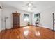 Light filled bedroom with hardwood floors, ample space, and neutral paint at 4828 Lakewood Dr, Acworth, GA 30101