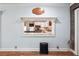 Pass through to bright kitchen featuring white cabinets and counters visible from living area at 4828 Lakewood Dr, Acworth, GA 30101
