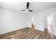 Hardwood bedroom with one bathroom entrance at 5915 Trent Walk Dr, Lithonia, GA 30038