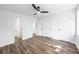 Hardwood bedroom with three doors and one bathroom entrance at 5915 Trent Walk Dr, Lithonia, GA 30038