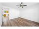 Well-lit bedroom with wood-look floors and a ceiling fan at 5915 Trent Walk Dr, Lithonia, GA 30038