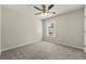 Neutral bedroom with a ceiling fan and a window providing natural light at 2829 Priestcliff Se Dr, Smyrna, GA 30080