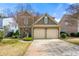 Charming two-story home with a two-car garage and well-maintained landscaping at 2829 Priestcliff Se Dr, Smyrna, GA 30080