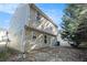 View of the back of the home showing the siding and access door to the backyard at 5987 Westchase St, Atlanta, GA 30336