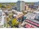 An aerial view showcasing the building, surrounding neighborhood, and cityscape views at 650 Glen Iris Ne Dr # 15, Atlanta, GA 30308