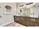 Modern bathroom with double vanity, granite countertops, and a glass-enclosed shower at 650 Glen Iris Ne Dr # 15, Atlanta, GA 30308