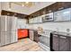 Stylish kitchen features stainless steel appliances, and sleek cabinetry at 650 Glen Iris Ne Dr # 15, Atlanta, GA 30308