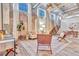 Open-concept living space with exposed brick, high ceilings, and modern decor at 650 Glen Iris Ne Dr # 15, Atlanta, GA 30308