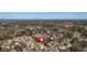 Expansive aerial view of a neighborhood showcasing lush greenery, trees, and well-maintained homes at 10780 S Kimball Bridge Xing, Alpharetta, GA 30022