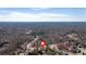 Scenic aerial view of a residential area featuring houses nestled among mature trees at 10780 S Kimball Bridge Xing, Alpharetta, GA 30022