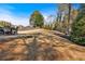 A large, fenced backyard with space for a variety of activities and entertainment at 10780 S Kimball Bridge Xing, Alpharetta, GA 30022