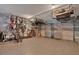 Organized garage with epoxy floors, ample storage, and room for multiple vehicles at 10780 S Kimball Bridge Xing, Alpharetta, GA 30022