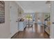Hallway with a view of the dining area and backyard at 10780 S Kimball Bridge Xing, Alpharetta, GA 30022