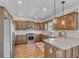 Well-equipped kitchen with stainless steel appliances and granite countertops at 10780 S Kimball Bridge Xing, Alpharetta, GA 30022