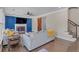 Cozy living room with a fireplace, TV, and comfortable seating at 10780 S Kimball Bridge Xing, Alpharetta, GA 30022