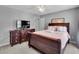 Bedroom featuring a ceiling fan and light-filled windows at 142 Parkway Dr, Fairburn, GA 30213