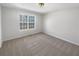 This bedroom offers a light-filled space, perfect for relaxation and rest at 405 Willow Shoals Dr, Covington, GA 30016