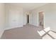 Bright bedroom with carpet, large closets and adjacent bathroom for convenience at 731 Crest Line W Trl, Powder Springs, GA 30127