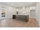 Beautiful kitchen featuring a spacious island, stainless steel appliances, and contemporary pendant lighting at 731 Crest Line W Trl, Powder Springs, GA 30127