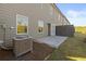 The backyard features a small patio, gray privacy fence, and manicured landscaping at 228 Epping Street # 8, Stockbridge, GA 30281