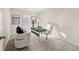 Home office with neutral carpet, a modern desk, and white accents provides an ideal work-from-home setup at 228 Epping Street # 8, Stockbridge, GA 30281
