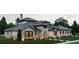 Charming new build with white brick, dark trim, lush landscaping, and stone accents at 4313 Acworth Dallas Rd Lot 2 Dr, Acworth, GA 30101