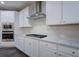Kitchen featuring stainless steel appliances, built-in microwave, and gas range at 6650 Canyon Cv, Cumming, GA 30028