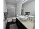 The bathroom has a shower with white subway tile and a modern sink at 9620 Carolina Dr, Jonesboro, GA 30238