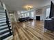 Spacious living room with hardwood floors, fireplace, and plenty of natural light at 9620 Carolina Dr, Jonesboro, GA 30238