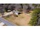 The aerial view reveals the home's position on a large lot at 4983 Arcado Sw Rd, Lilburn, GA 30047