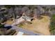 Birds eye view of home shows the roof, yard, and surroundings at 4983 Arcado Sw Rd, Lilburn, GA 30047