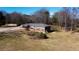 An elevated shot of the house reveals the extensive driveway at 4983 Arcado Sw Rd, Lilburn, GA 30047