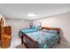 Finished basement featuring tile floors, neutral paint, and sleeping area with furniture at 4983 Arcado Sw Rd, Lilburn, GA 30047