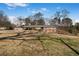 Sprawling front lawn accentuates this charming brick home at 4983 Arcado Sw Rd, Lilburn, GA 30047