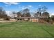 Sprawling front lawn accentuates this charming brick home at 4983 Arcado Sw Rd, Lilburn, GA 30047