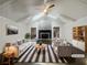 Bright, staged living room with vaulted ceilings, fireplace, and modern furnishings at 5926 Brassie Ridge Ln, Ellenwood, GA 30294