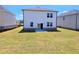 Spacious backyard with lush lawn and a patio area at 2634 Mourning Dove Drive (Lot 41), Grayson, GA 30017