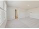 Spacious bedroom featuring neutral carpet, white walls, and natural light through large windows at 2634 Mourning Dove Drive (Lot 41), Grayson, GA 30017