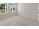 Neutral bedroom with large windows and plush carpeting at 2634 Mourning Dove Drive (Lot 41), Grayson, GA 30017