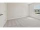 Bedroom features plush carpet, white walls, a double door closet and a window at 2634 Mourning Dove Drive (Lot 41), Grayson, GA 30017