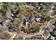 Aerial view showcases the property, pool, and the surrounding neighborhood at 4970 Lost Mountain Nw Trce, Kennesaw, GA 30152