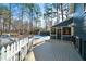 Expansive backyard with deck, screened porch, and an inviting in-ground swimming pool at 4970 Lost Mountain Nw Trce, Kennesaw, GA 30152