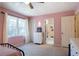 Bright bedroom with a large window, walk-in closet and an ensuite bathroom at 4970 Lost Mountain Nw Trce, Kennesaw, GA 30152