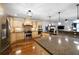 Spacious kitchen with granite countertops, stainless steel appliances, and open layout to living spaces at 4970 Lost Mountain Nw Trce, Kennesaw, GA 30152